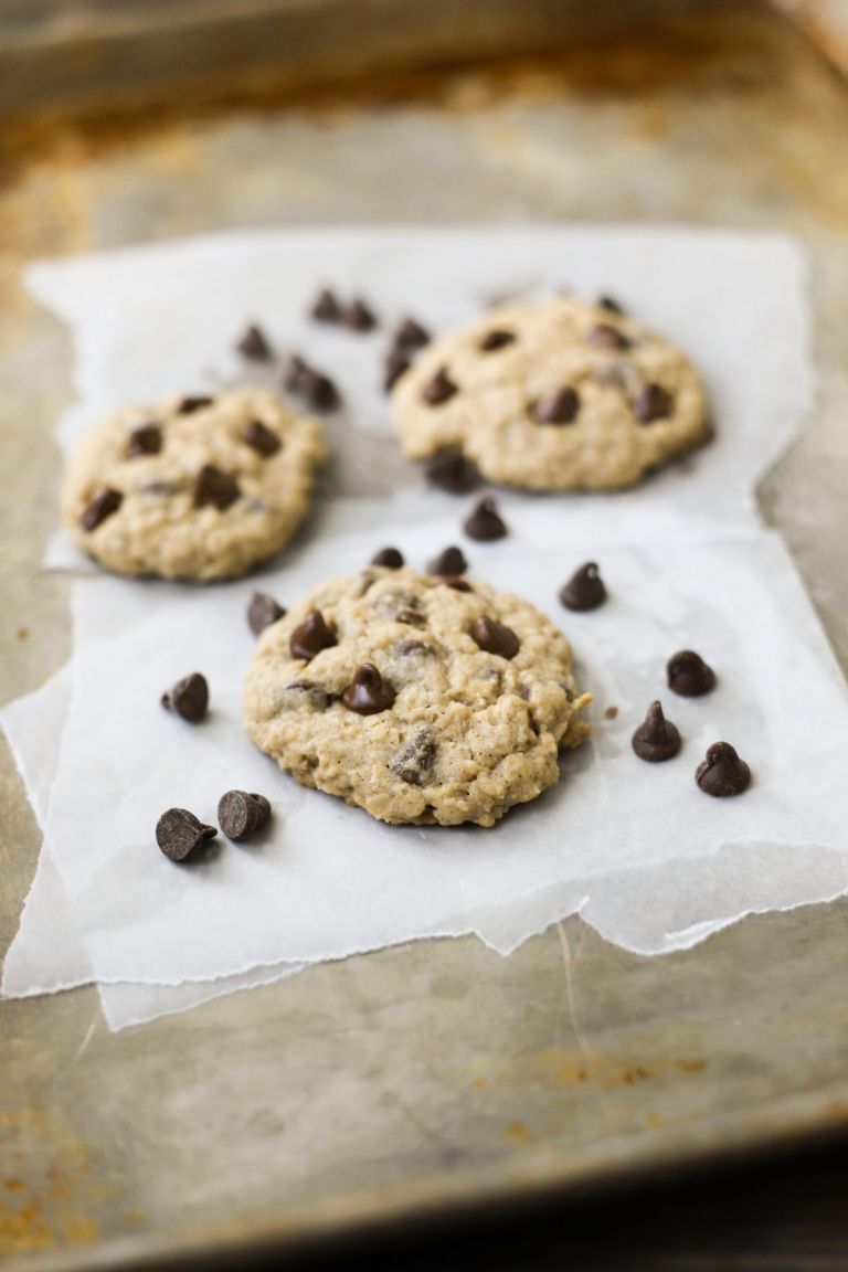 Oatmeal Chocolate Chip Cookies on parchment paper