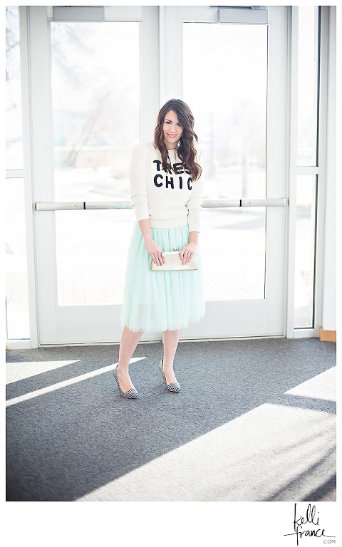Tres Chic knit sweater, tulle skirt, black and white pumps