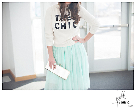 Tres Chic knit sweater, tulle skirt, black and white pumps