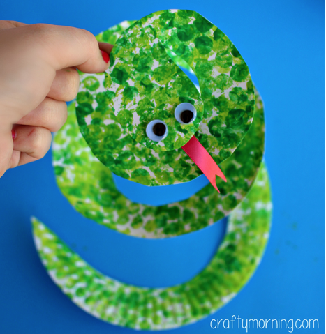 Bubble Wrap Art of a Green snake. 