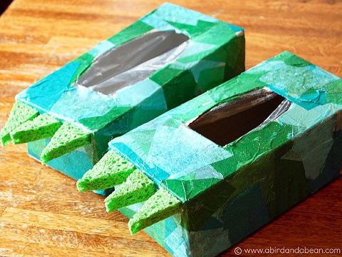recycled art project of tissue box dinosaur feet