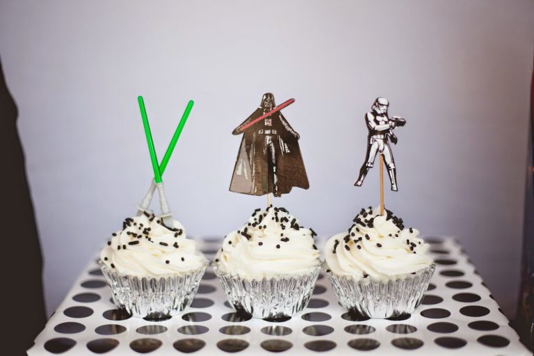 Star Wars cupcakes with light sabers, Darth Vader and storm trooper.