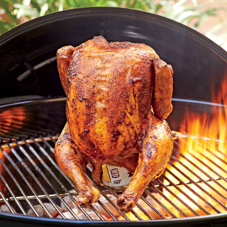 Roasted whole chicken cooking on the big green egg