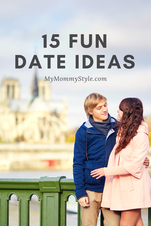 15 active date ideas with couple gazing at each other on their date while standing on a bridge.