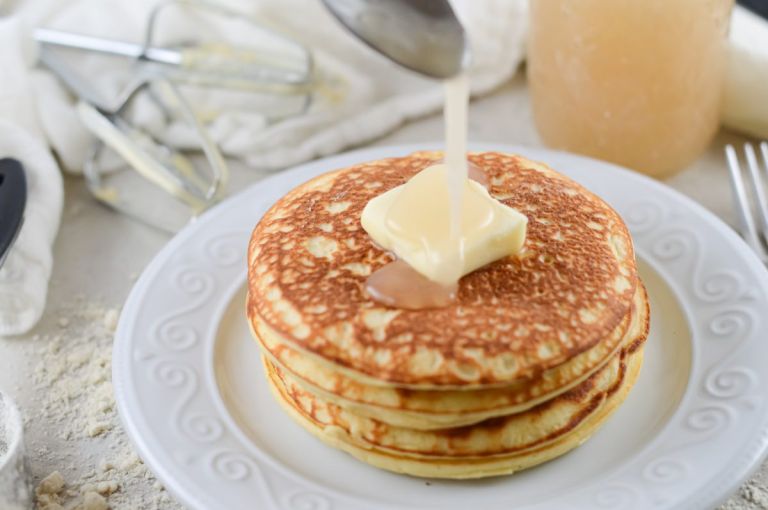 Syrup drizzling on Keto Coconut flour pancakes
