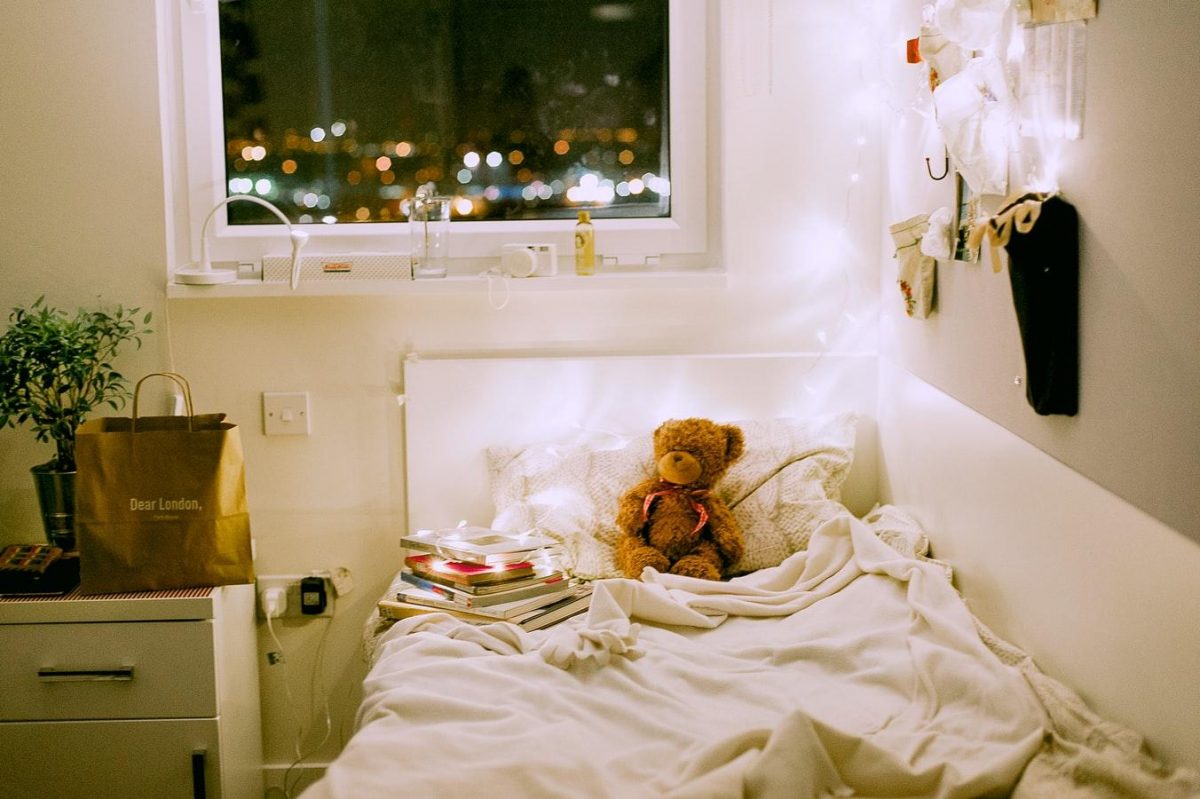 Bed with teddy bear