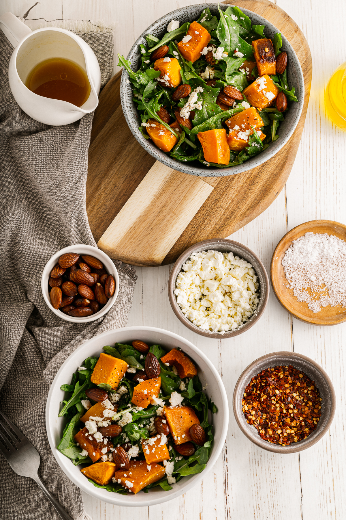 two bowls of roasted butternut squash salad